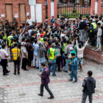 Protesters gather outside Nepal's army headquarters during a curfew imposed to restore law and order in Kathmandu on September 11, 2025
