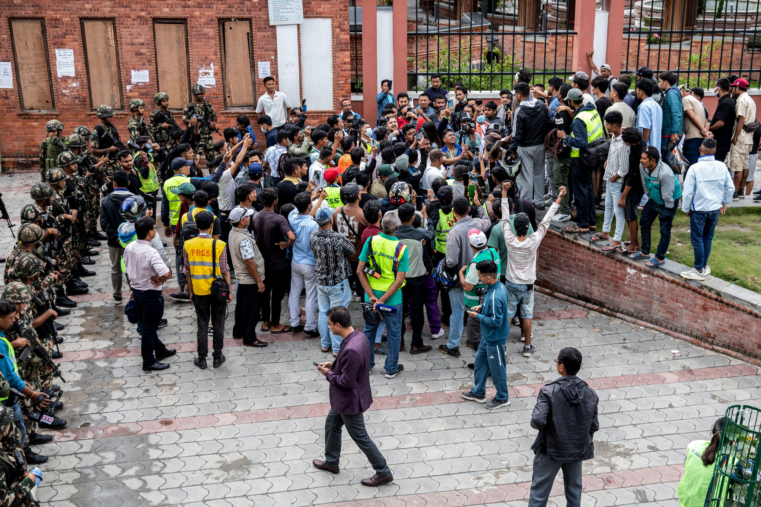 Protesters gather outside Nepal's army headquarters during a curfew imposed to restore law and order in Kathmandu on September 11, 2025